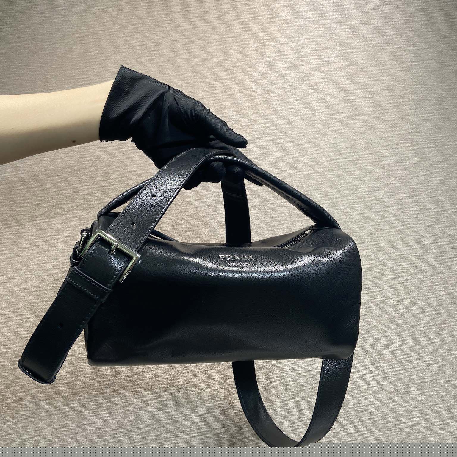 Pra*a top handle bags